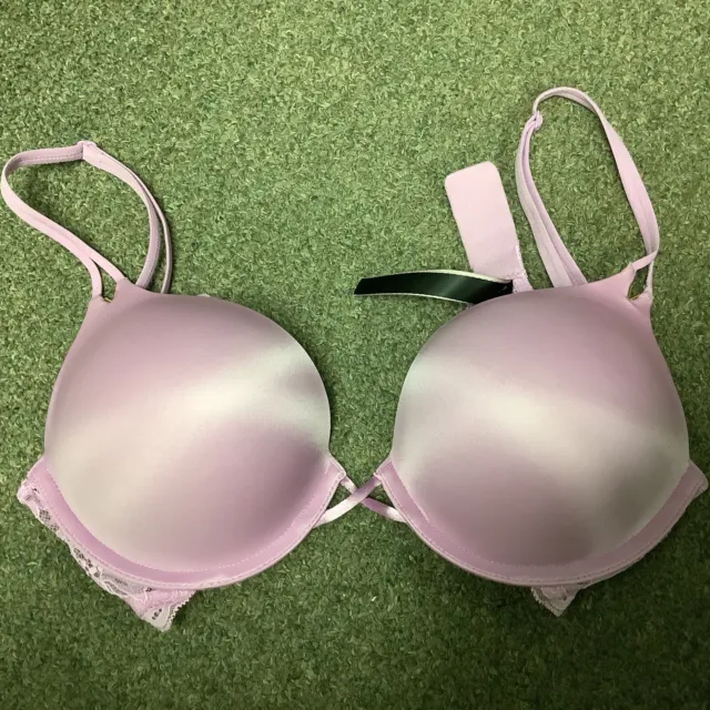 GENTLY USED VICTORIA SECRET PLUNGE PUSH UP BRA. SIZE 36DD IN NUDE