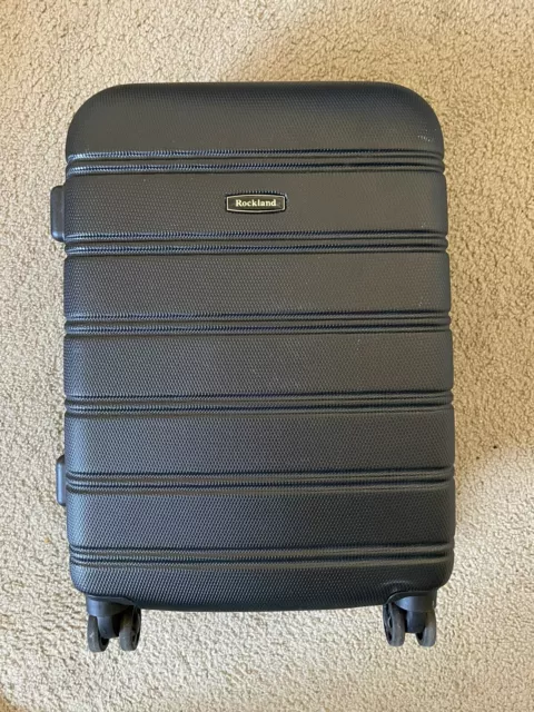 Rockland Melbourne Hard Expandable Wheel Luggage Carry-On suitcase away