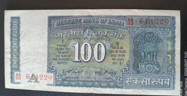 OLD Antique Indian 100 Rupees note Red serial number DAM ISSUE. I .G.PATEL rare.