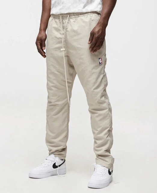 Fear of god x nike tear away pants hotsell