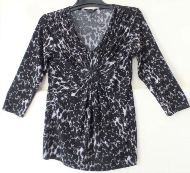 Daisy Fuentes top Womens size L  animal print  v neck knot front spandex 3/4 slv