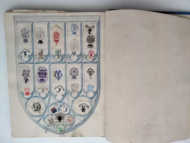 A late Victorian and early Edwardian collection of crests and monograms in album