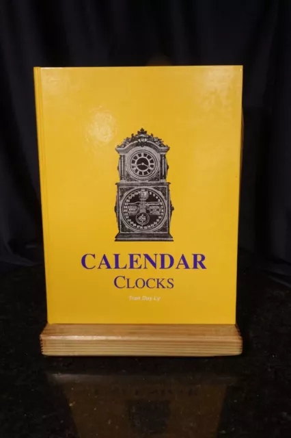 CALENDAR CLOCKS by TRAN DUY LY - ID & PRICING GUIDE - A MUST FOR THE COLLECTOR