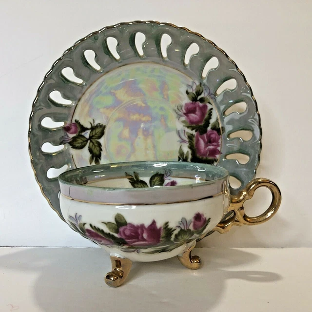 Taza y platillo vintage de rosas iridiscentes diseño perforado de patas pequeñas