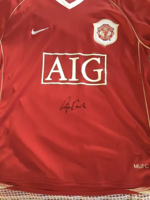 Manchester United Home Shirt Signed by Sir Bobby Charlton.