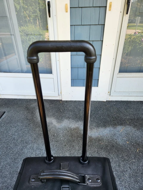 Tumi Black Wheeled Rolling Suitcase Luggage 22"  READ 2