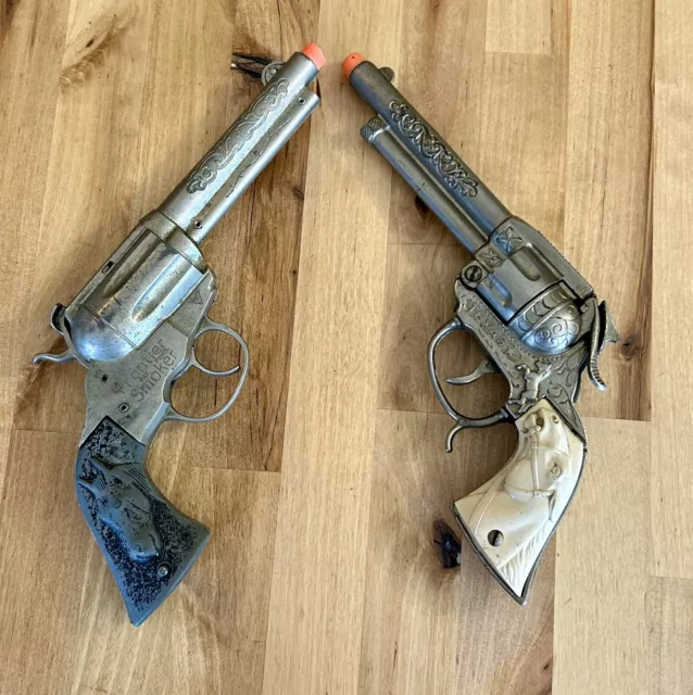 2 Vintage Western Cap Gun Toys LESLIE TEXAS & PECO FRONTIER SMOKER Toy Guns