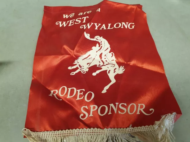 We are a WEST WYALONG RODEO Sponsor Silk Pennant