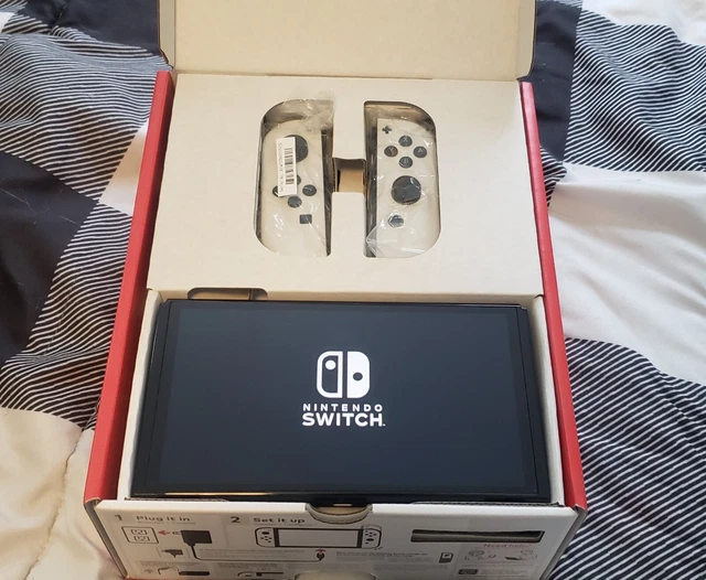 NINTENDO SWITCH OLED Model HEG001 with upgraded 512 GB SAMSUNG EVO A2