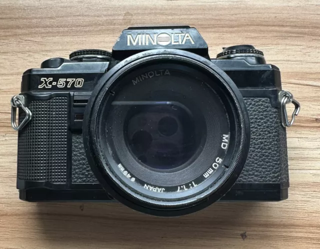 Minolta X-570 SLR Film Camera Body with MD 50mm F1.7 Lens Battery Tested Working