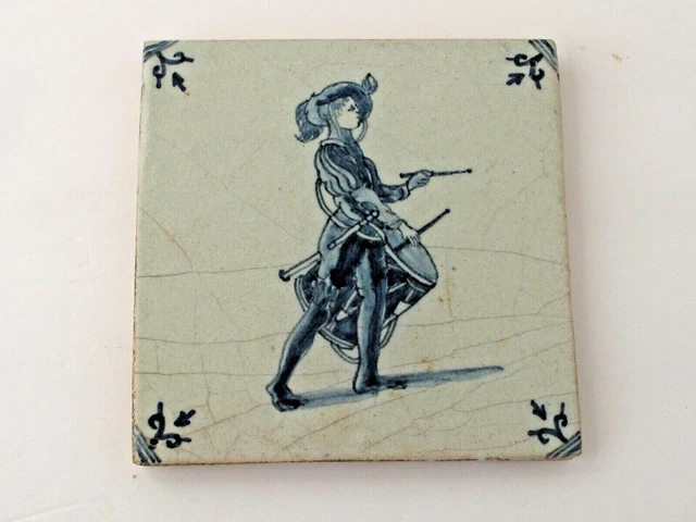 Antique Blue and White Dutch Delft Tile Man with Drums  17thc.