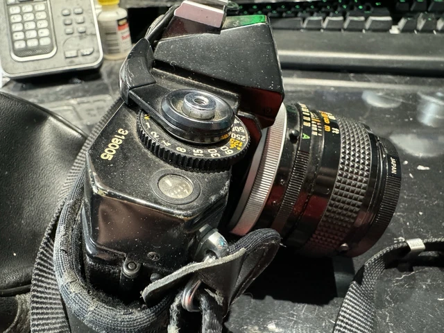 Canon EF 35mm Manual SLR (1973-) with three lens
