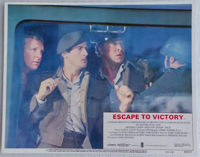 ORIGINAL 1981 LOBBY CARD 14 x 11 - 'ESCAPE TO VICTORY' - STALLONE, CAINE, MOORE