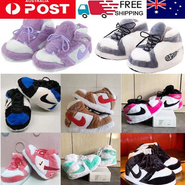 Plush sales nike slippers