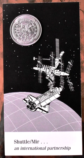 NASA Medallion, contains metal from both Shuttle & Space station MIR w/ brochure