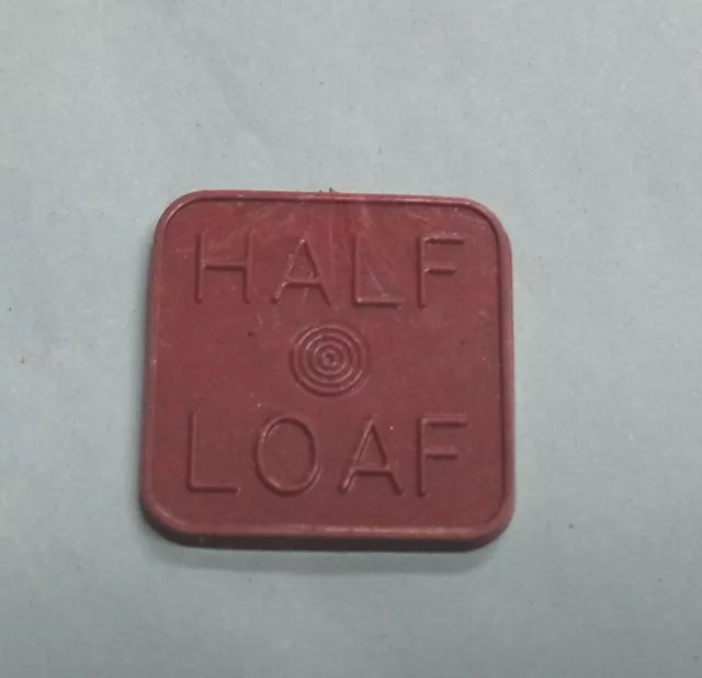 #D275.    Lithgow  Co-Op.   Bread  Half Loaf  Plastic   Token 2