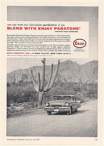 1957 Enjay Paratone Oil Lubricants Mercury Car Driving in Desert Print Ad