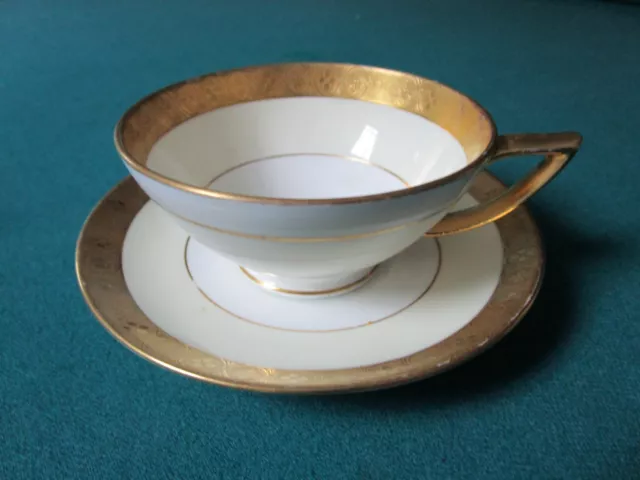 Mintons England Cup And Saucer Whith Gold Rim  J.e.caldwell Pa