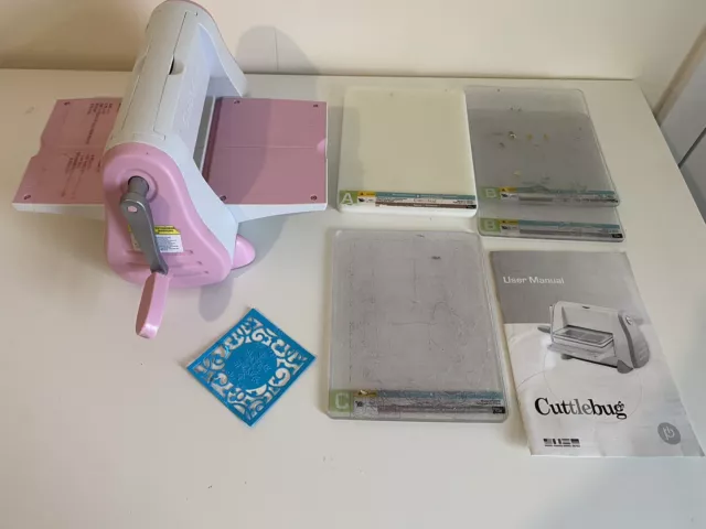 Cricut Cuttlebug Pink Foldaway Die Cutting Machine including plates instructions