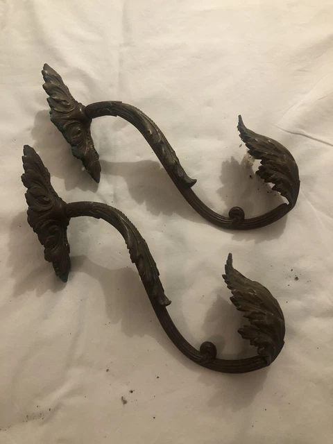 Antique French Nineteenth Century pair of quality ornate curtain hold backs.