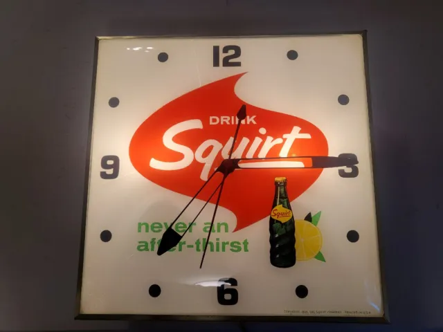 1965 Squirt Square Lighted Clock. Pam Clock Co. Works