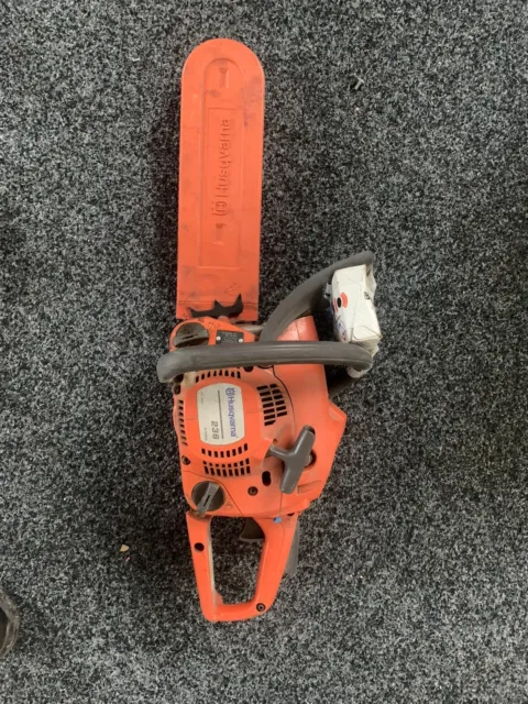 Husqvarna Chainsaw With 2 Spare Chains