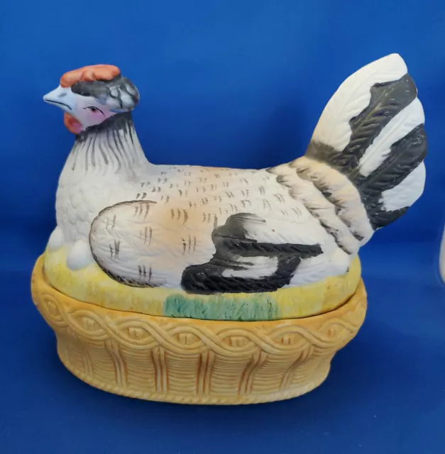 Antique Bisque Porcelain  Staffordshire Chicken On An Egg Basket.