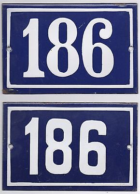 Old blue French house number 186 door gate wall fence street sign plate plaque