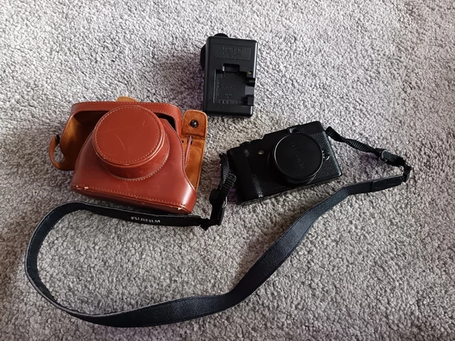 FUJIFILM X10 12MP Digital Camera with Leather Case and Accessories