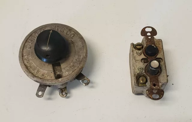 antique electrical rheostat Ohmite mfg.co and push button electrical switch.