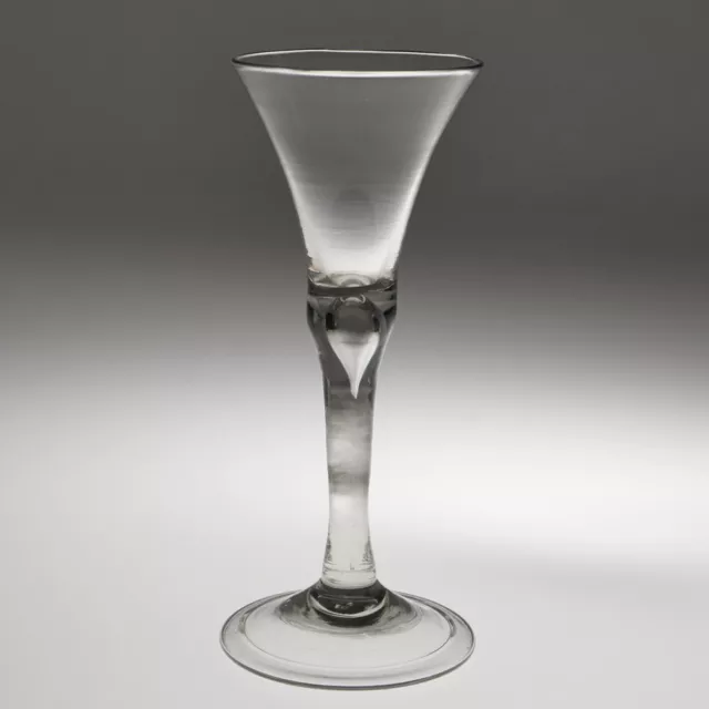 An 18th Century Plain Stem Wine Glass With Folded Foot c1750