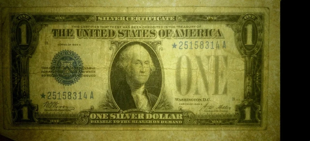 1928 A *STAR NOTE* One Dollar Funny Back Silver Certificate.