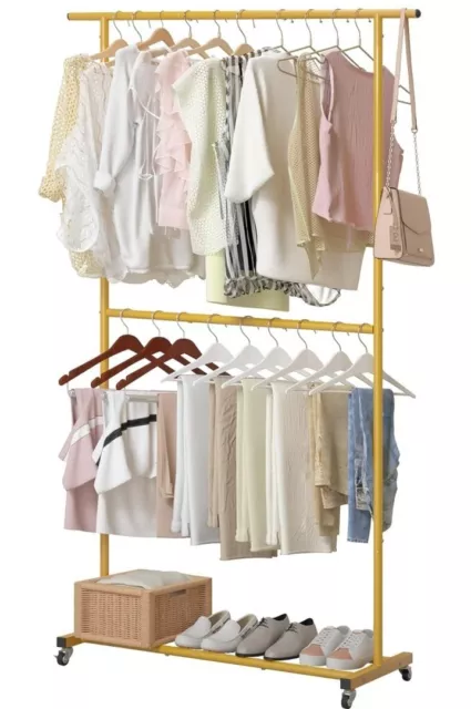 Organizador de ropa de doble caña con estante de ropa rodante sobre ruedas dorado