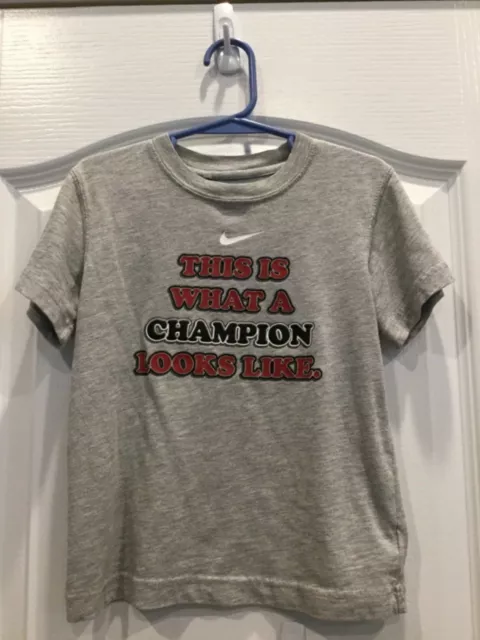 Nike Boys Graphic T Shirt Size 4 Graphic This is What a Champion Looks Like 215
