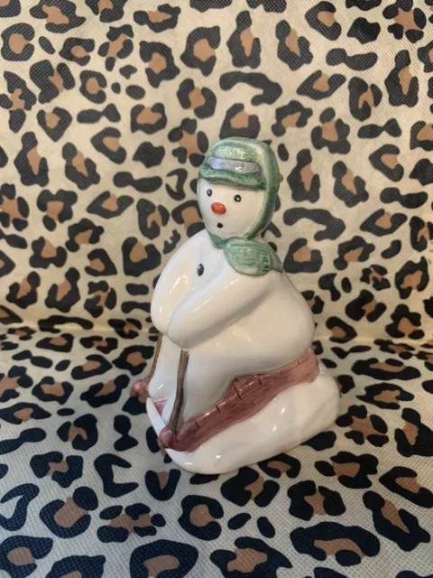 Royal Doulton “ The Snowman “ On Toboggan