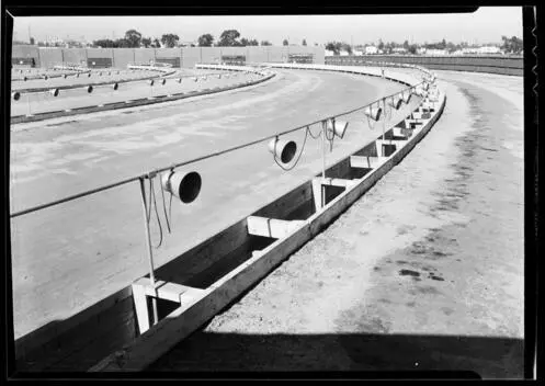 Rows of speakers in the parking lot of an empty drive-in movie the - Old Photo