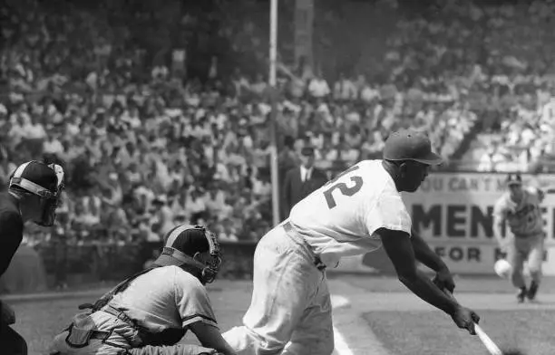 Brooklyn Dodgers Jackie Robinson in action, batting during game vs - Old Photo