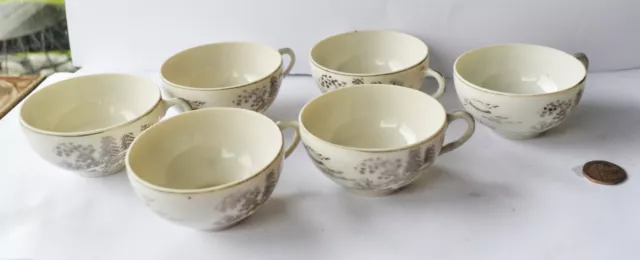 6 Japanese Eggshell Porcelain Tea Cups with Lithophane bases depicting Geisha