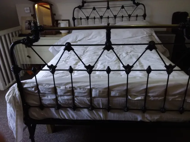 Antique iron bedstead, frame.