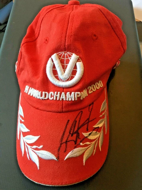 A Ferrari promotional cap signed by Michael Schumacher
