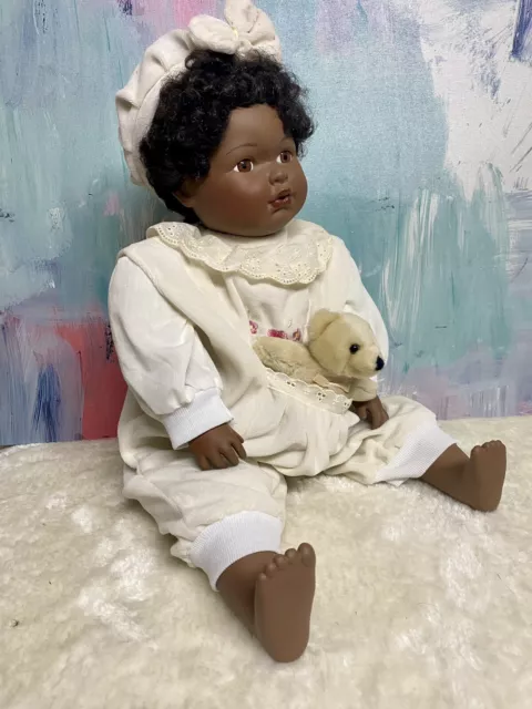 Porcelain Baby Brown Doll, In 3- Piece Set, - With Teddy In Pocket.   60Cm Tall.