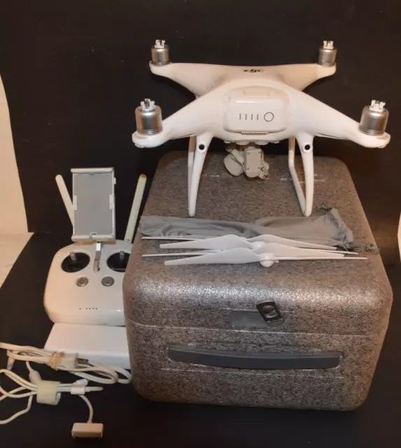 Working Dji Phantom 4 Pro V1 Drone 20 Mp Camera, Charger, Blades, And Case
