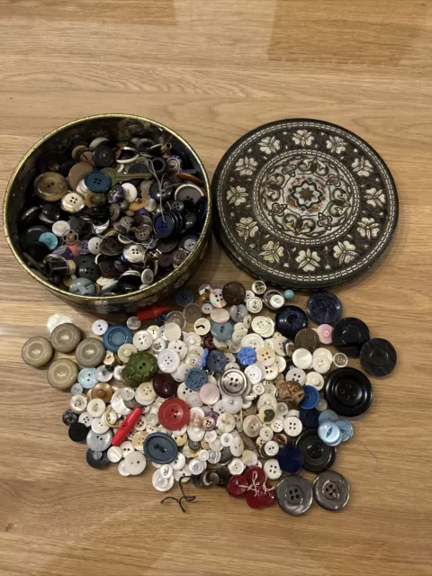 vintage tin of buttons