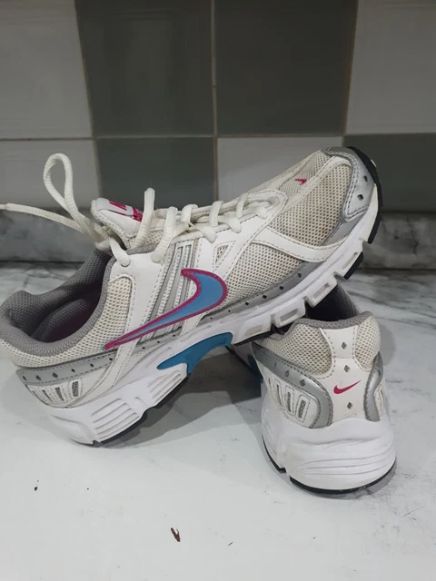 Pink and blue nike trainers hot sale