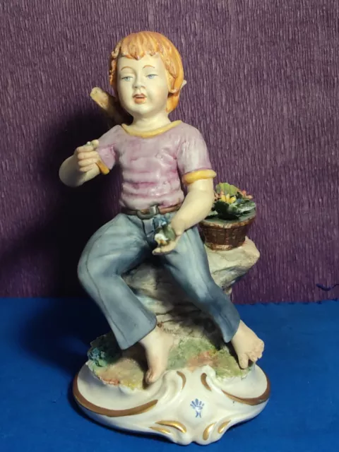 Capodimonte Boy with Flowers Porcelain Figurine