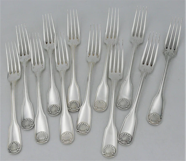 Christofle Vendôme/Arcantia/Coquille, 12 fourchettes de table en métal argenté.
