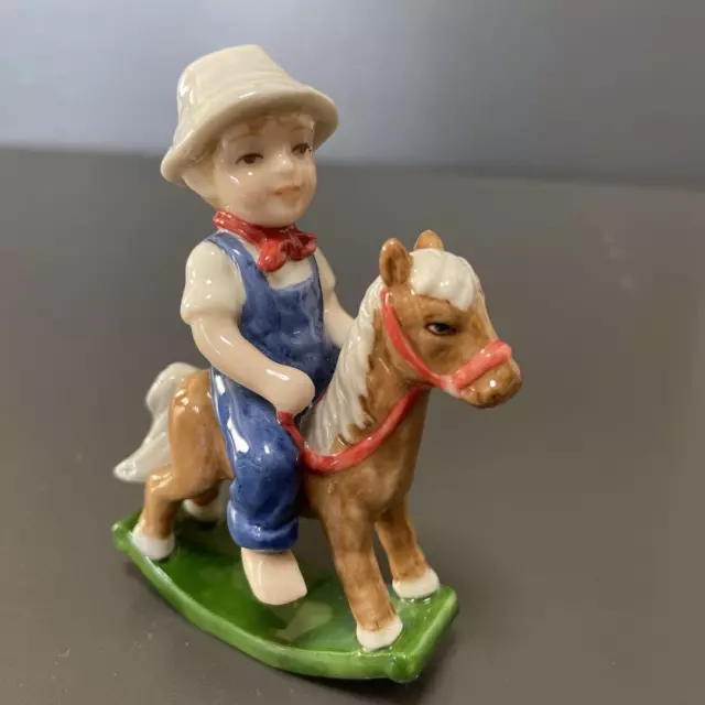 Royal Copenhagen a boy riding a wooden horse Elegant Graceful Formal Luxury JP