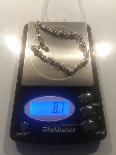 14K White Gold Simulated Blue Sapphire w / Diamond Chips Tennis Bracelet 14K White Gold Simulated Blue Sapphire w / Diamond Chips Tennis Bracelet
