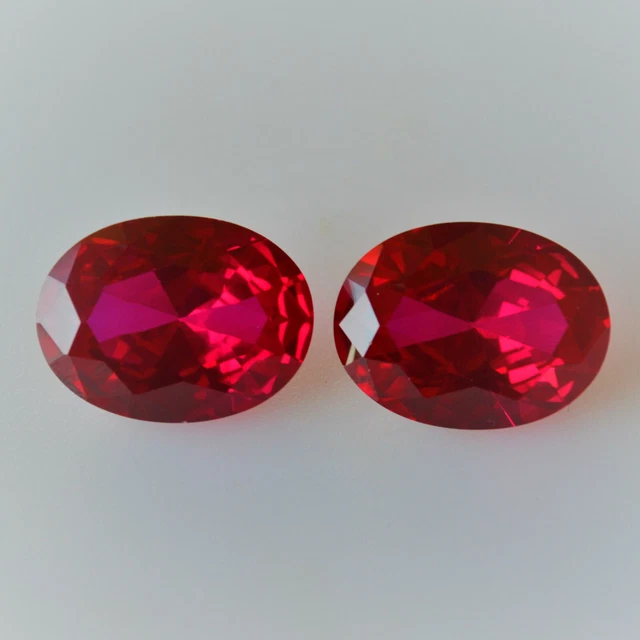 Paire De Rubis Du Mozambique Traités - 1,93 Carats Total - Taille Ovale, Couleur Rouge (remplissage Verre Au Plomb)