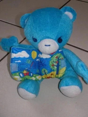 ours doudou nestlé peluche bleu OURSON LIVRE 18 CMS ASSIS NEUF